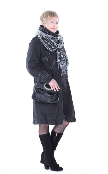 fashionable woman in a black coat and scarf.isolated on white. - Valokuva, kuva