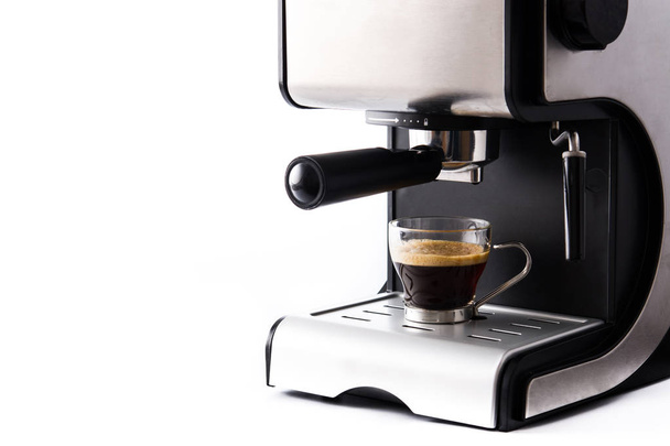 fresh coffee in espresso coffee machine isolated on white background. Copyspace - Zdjęcie, obraz