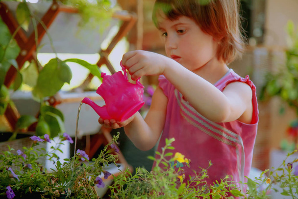 Child development in harmony with nature. Little beautiful girl  - Photo, image