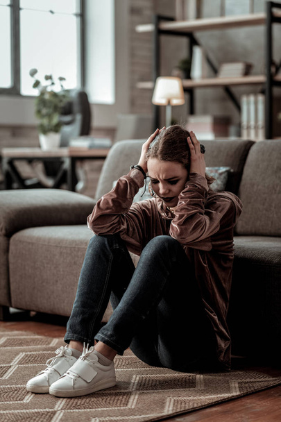 Teenage girl having strong headache after big depression - Фото, зображення