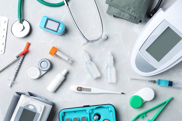 Flat lay composition with medical objects on grey background - Fotoğraf, Görsel