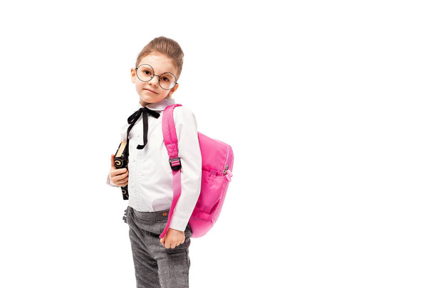 Child with schoolbag. Girl with pink school bag isolated on white. - Foto, Imagem