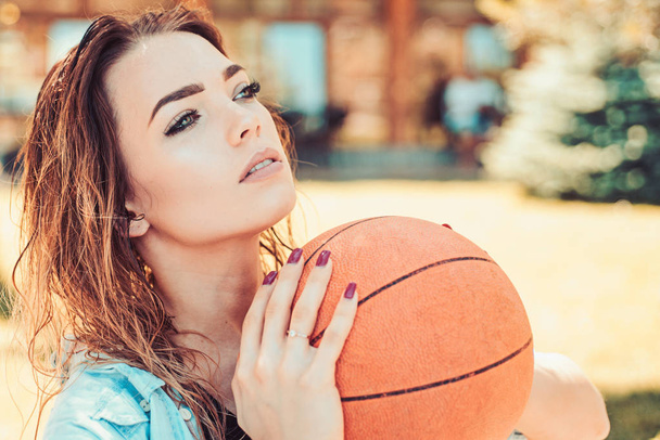 From ball handling to free throw shooting. Sexy woman enjoy ball exercises for sport training. Sport woman. Pretty woman with basketball. Sensual basketball player shooting a ball - Fotoğraf, Görsel
