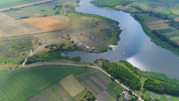 Flying over the fields and river - Footage, Video