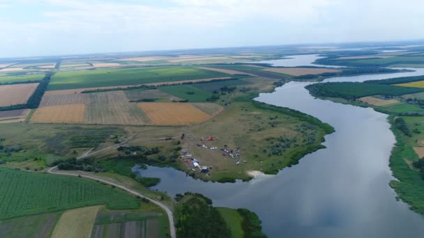 Flying over the fields and river - Footage, Video