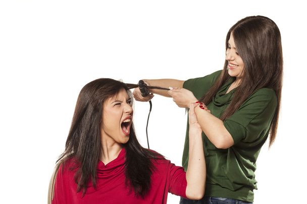 Hair ironing problem - Foto, immagini