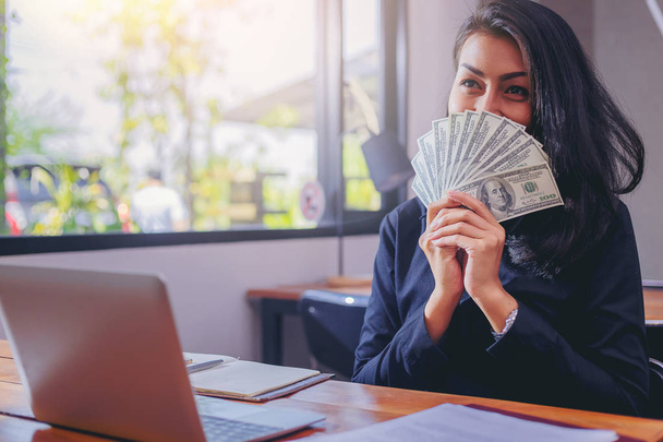 happy woman with dollars money in her hand.  - Fotografie, Obrázek