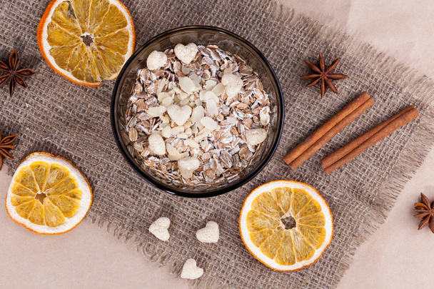 Healthy food. Muesli in a bowl on a light background. Porridge for breakfast on a linen background - Photo, Image