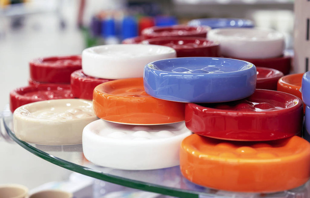 Round ceramic soap dishes of bright colors. - Photo, Image
