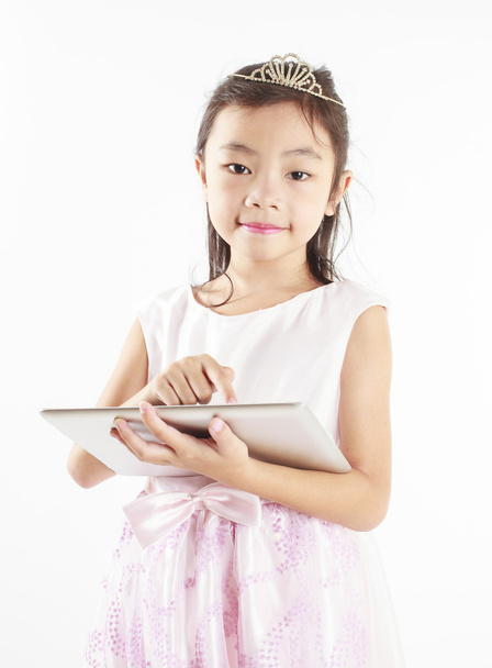 Cute girl use a tablet - Photo, Image