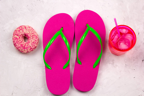 top view summer flippers,cold cocktail and donut - Фото, изображение