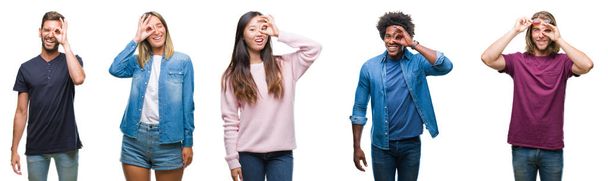 Composition of african american, hispanic and chinese group of people over isolated white background doing ok gesture with hand smiling, eye looking through fingers with happy face. - Zdjęcie, obraz