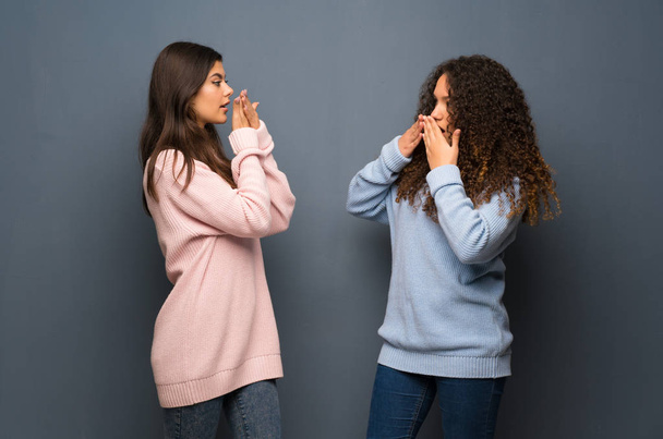Teenager friends covering mouth with hands for saying something inappropriate - Zdjęcie, obraz