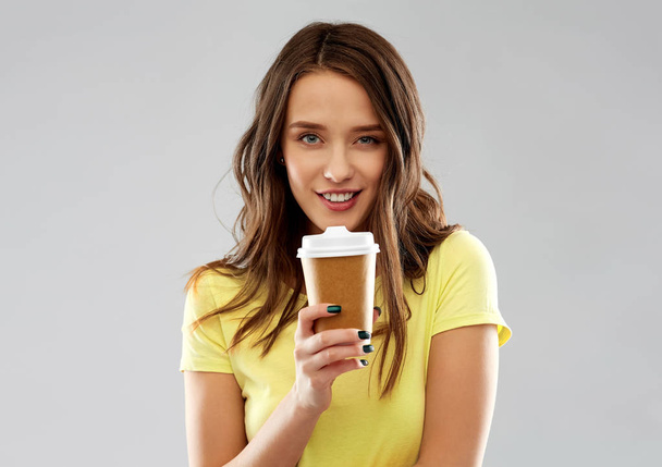 young woman or teenage girl drinking coffee - Photo, image