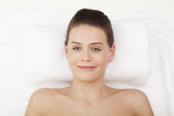 Happy lady relaxing in massage salon - Photo, Image