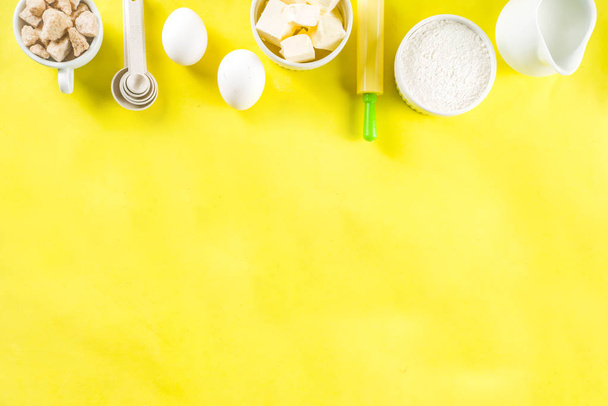Baking ingredients on yellow background - Photo, Image