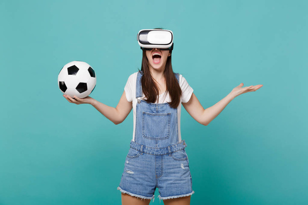 Screaming woman football fan in headset holding soccer ball, spr - Photo, Image