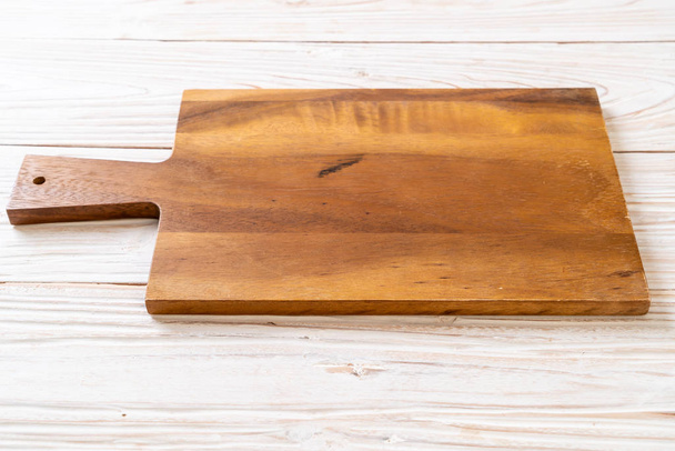 empty cutting wooden board with kitchen cloth - Φωτογραφία, εικόνα