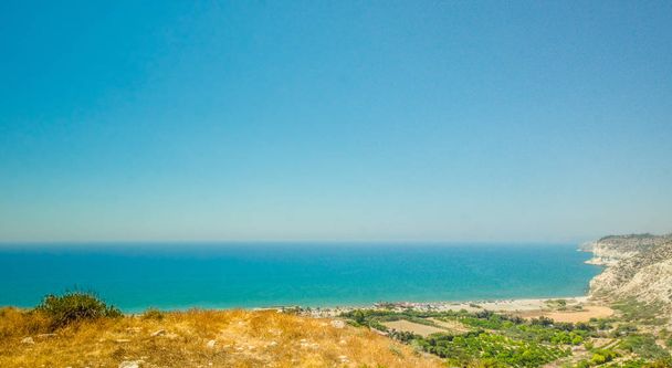 Best beaches of Cyprus. Cyprus reef. Legendary bridge lovers. Amazing blue green sea and sunny day. - Fotó, kép