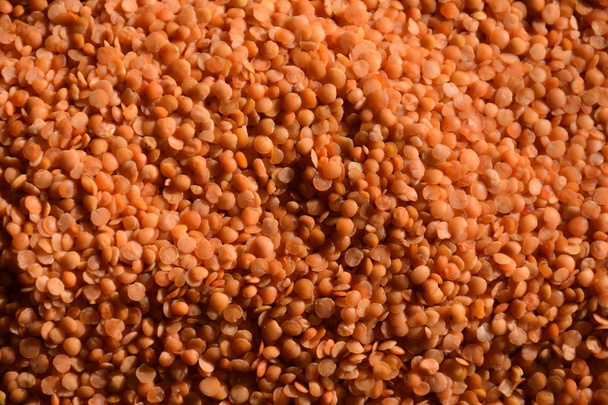 red lentils on a black background - Photo, Image