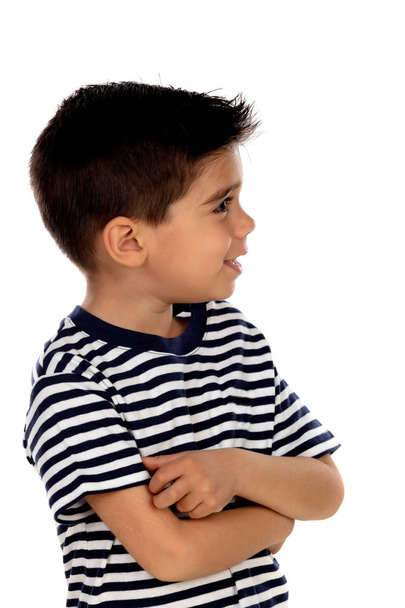 Pensive child with black eyes isolated on a white background - Fotoğraf, Görsel