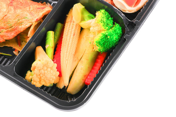 close up vegetables and egg  in lunch box set on white  - 写真・画像