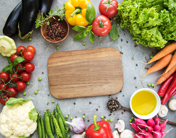 Empty board and fresh vegetables - Photo, Image