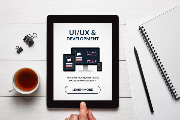 UI / UX design and development concept on tablet screen
 - Фото, изображение