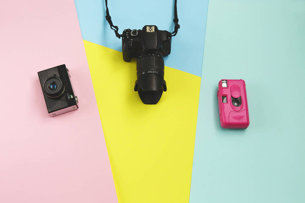 Fashion Film Camera. Minimal Creative style with colorful paper backdrop Pastel Sweet Style. Flat lay. top view. Copy space. - Photo, Image