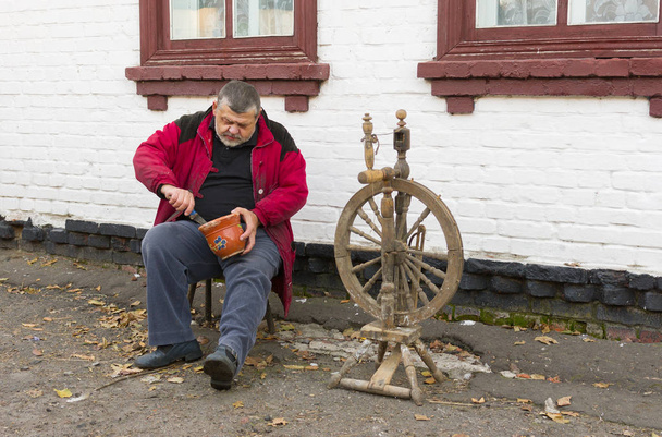 Ukrainian country man doing daily work at the homestead - Photo, Image