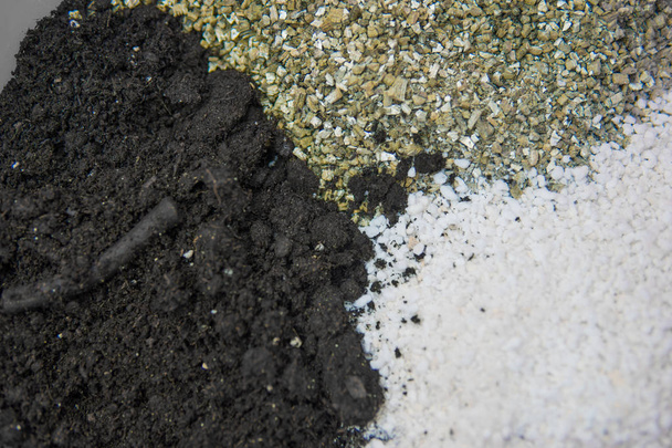 A mixture of earth, perlite and vermiculite. The concept of growing medical cannabis in the doore indoor. Soil for growing cannabis. Substrate for marijuana. Close up. - Photo, Image