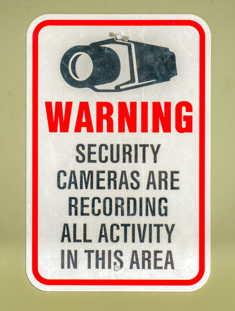 Segnale di avvertimento in un'area con telecamere di sicurezza
 - Foto, immagini