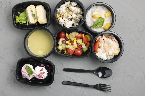 top view of delicious take away food  in containers - Foto, Imagem