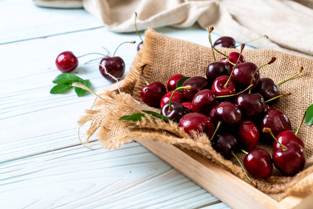 Fresh cherries in bowl  - Foto, Imagen
