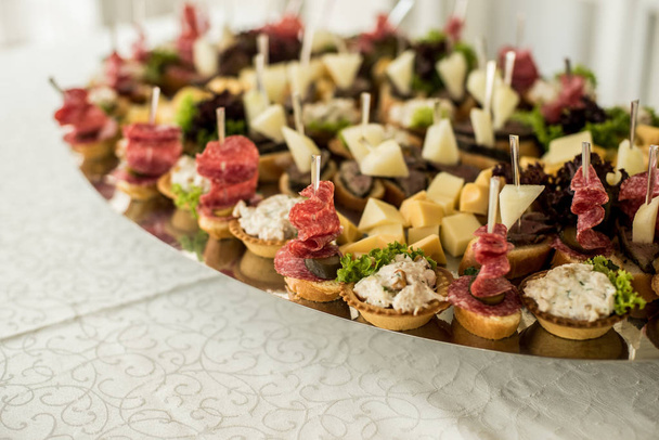 buffet snack sandwich fish cheese flavor tablecloth table celebration salami tray - Photo, Image