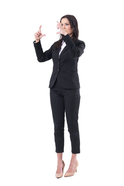 Business woman interaction with finger on virtual reality screen simulator. Full body isolated on white background.  - Valokuva, kuva