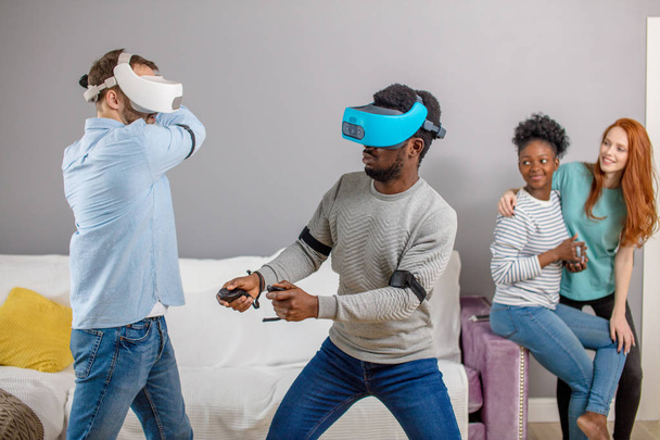 International students enjoying together with glasses of virtual reality - Фото, изображение