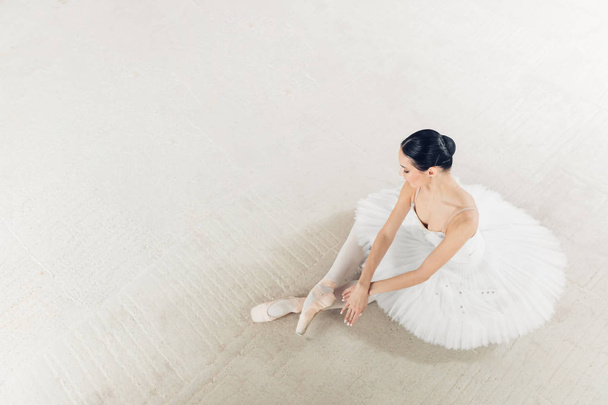 top view photo. talented ballerina has finished her wonderful performance - Φωτογραφία, εικόνα