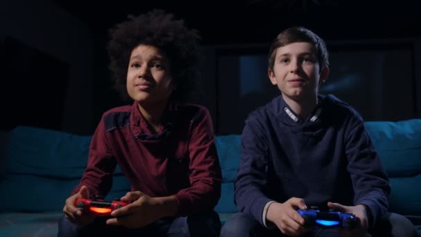 Duel between best friends playing shooter game - Footage, Video