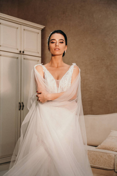 beautiful sensual bride with dark hair in luxurious wedding dres - Zdjęcie, obraz