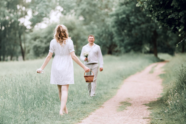 happy husband and wife walking towards each other - Foto, Bild