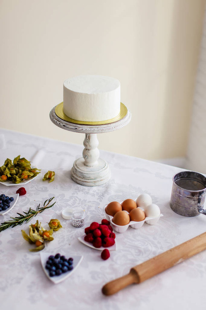 white yummy cake is prepared for decoration - Фото, зображення