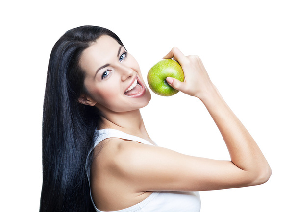 sexy woman eating green apple - Fotoğraf, Görsel