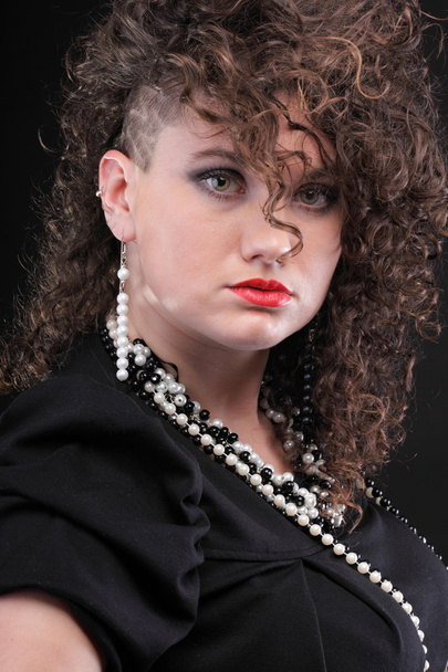 Ear super piercing woman curly girl - Foto, Imagen