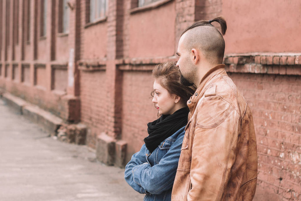 young loving couple standing on city street. - Valokuva, kuva