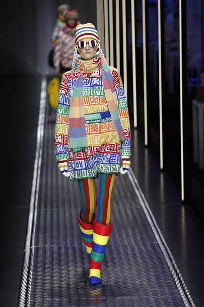 MILAN, ITALY - FEBRUARY 19: A model walks the runway at the United Colors Of Benetton show at Milan Fashion Week Autumn/Winter 2019/20 on February 19, 2019 in Milan, Italy. - Фото, изображение