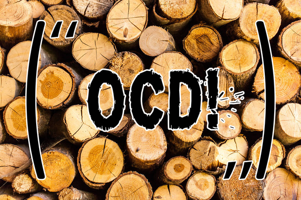 Handwriting text Ocd. Concept meaning Obsessive Compulsive Disorder Psychological Illness Medical Condition Wooden background vintage wood wild message ideas intentions thoughts. - Photo, Image