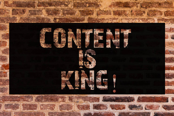 Text sign showing Content Is King. Conceptual photo articles or posts can guarantee you success Advertising Brick Wall art like Graffiti motivational call written on the wall. - Photo, Image