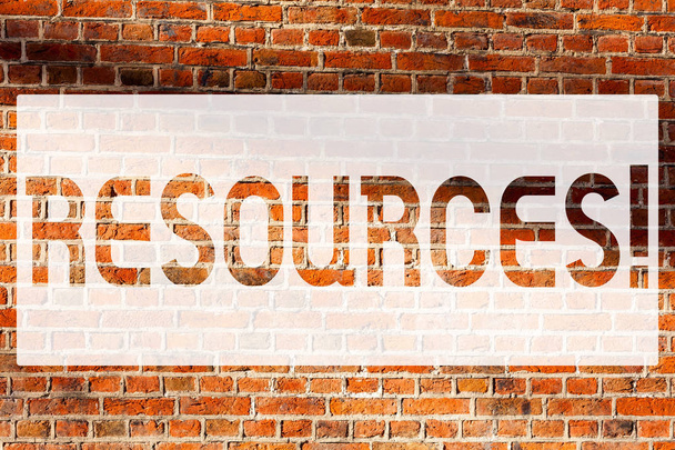 Text sign showing Resources. Conceptual photo Money Materials Staff and other assets needed to run a company Brick Wall art like Graffiti motivational call written on the wall. - Photo, Image
