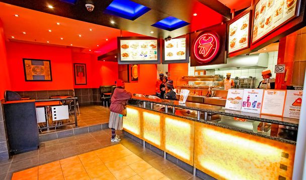 Interior of Fast Food Take Out Restaurant in a Mall - Фото, изображение